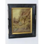 An Ernest Walbourn print under perspex featuring girl sat at an open door of cottage.