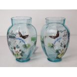 A delightful pair of pale blue glass hand painted vases,