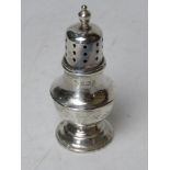 A HM silver pepperette bearing maker's mark for Adie Brothers Ltd and hallmarked Birmingham 1922,