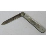 A HM silver and mother of pearl fruit knife, hallmarked for Sheffield 1913.