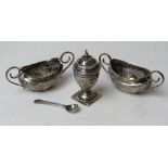 A pair of Walker & Hall HM silver salts having repoussé floral design upon, one handle a/f,