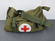 A Military First Aid kit with first aid