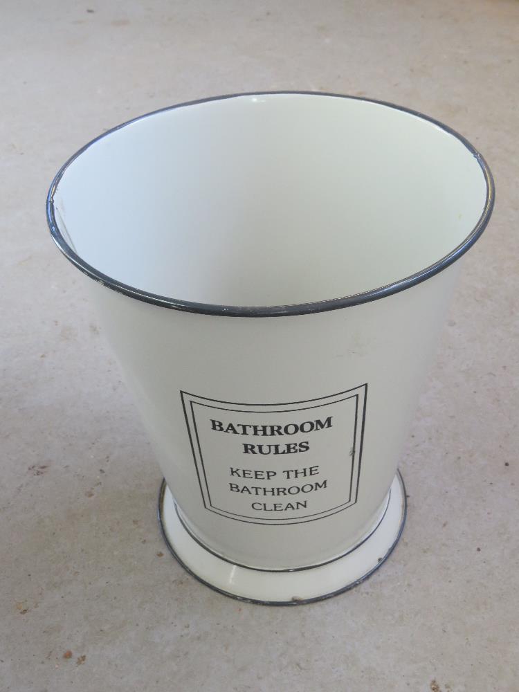 A contemporary enamelled type bucket 'Bathroom rules keep the bathroom clean' standing 27cm high.