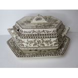 A large lidded tureen with matching tray