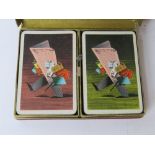 A double pack of Financial Times themed bridge playing cards in presentation box.