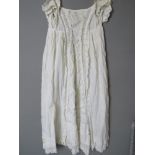 A white cotton and lace Christening robe