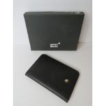A Mont Blanc leather card wallet in black with red interior, in original box.