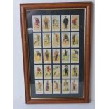 A framed montage of Cope's golfers cigarette cards, overall size 31 x 47cm.