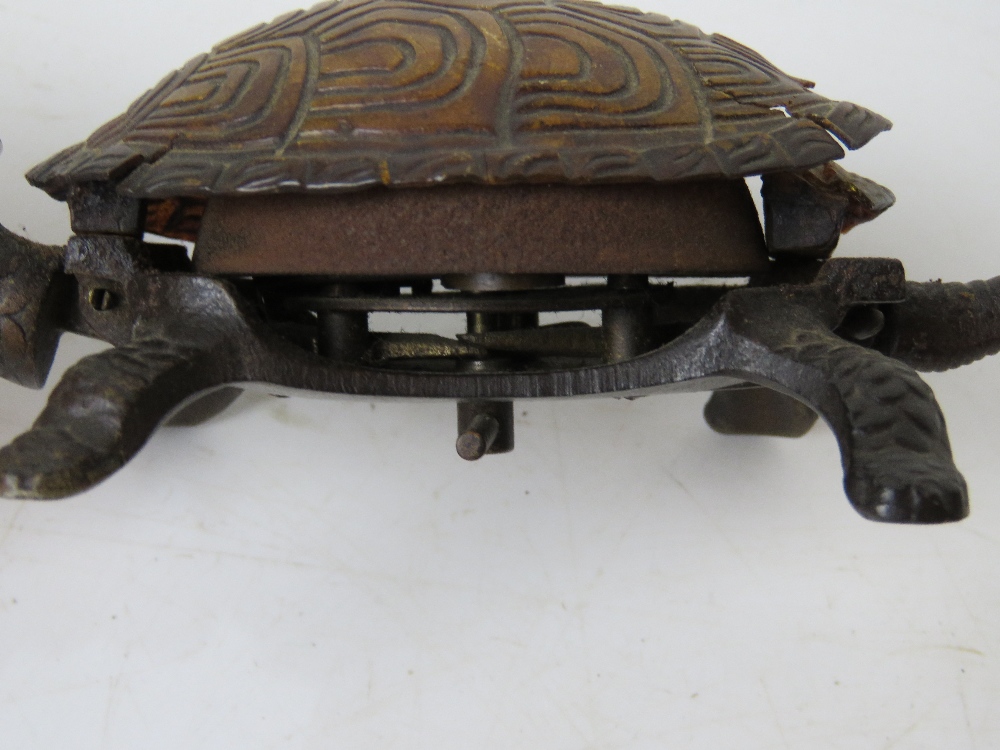 A clockwork tortoise, shell a/f, having hemispherical bell approx 15cm in length. - Image 3 of 3