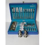 An Oneida cutlery set in blue leatherette box, together with a silver plated salt and pepper pots.