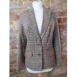 A wool blend ladies blazer size 12.