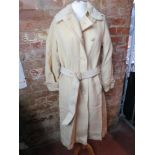 A ladies cream coloured 100% wool belted