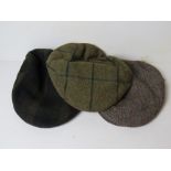 A Carey Gunmakers Ltd 100% wool cap together with a Hucklecote 100% cap, and another similar.