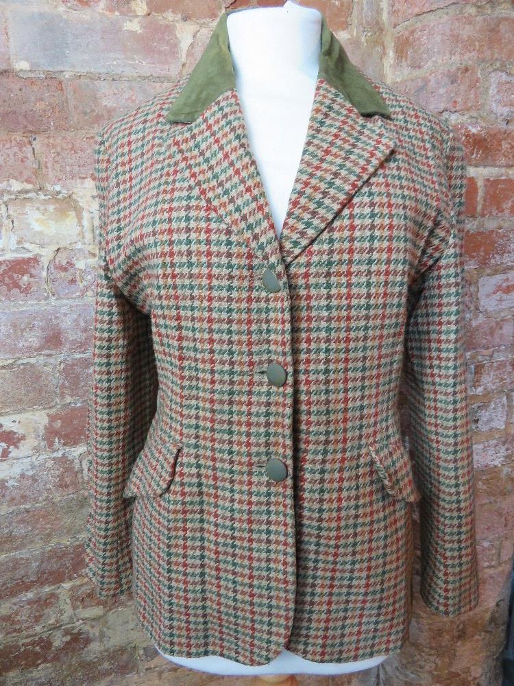 A ladies tweed jacket size 12.