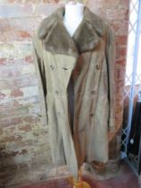 A vintage camel coloured suede coat havi