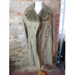 A vintage camel coloured suede coat havi