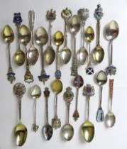 Twenty-two 925 silver souvenir spoons having various enamelled crests upon, 284g / 9.14ozt.