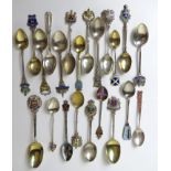 Twenty-two 925 silver souvenir spoons having various enamelled crests upon, 284g / 9.14ozt.