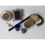 A quantity of silver items including four small photograph frames a/f,