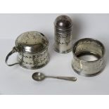 A HM silver cruet set comprising pepperette with blue glass liner,