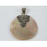 A silver and mother of pearl pendant, stamped 925, 3.5cm dia.