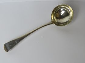 A George III HM silver short ladle, hallmarked London 1799, bearing 'C' monogram to terminal,