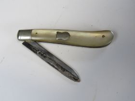 A HM silver and mother of pearl fruit knife.