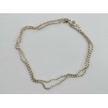 A silver bead chain, stamped 925 and dated 2001 with makers mark, 65cm in length.