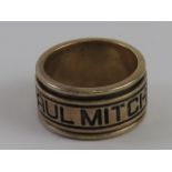 A silver ring by Paul Mitchell having slightly worn marks within, stamped 925, size R-S.