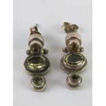 A pair of articulated silver earrings, set with citrine coloured stones, stamped 925.