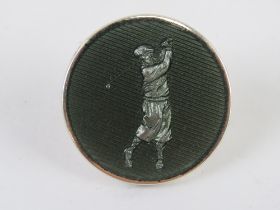A silver and enamel golf marker, stamped 925, with maker's mark KJD, 2.5cm dia.