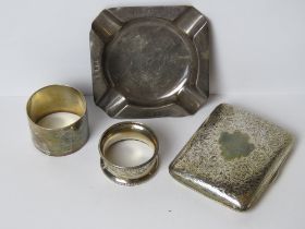 An HM silver cigarette case together with an HM silver smoker's receptacle and two napkins each