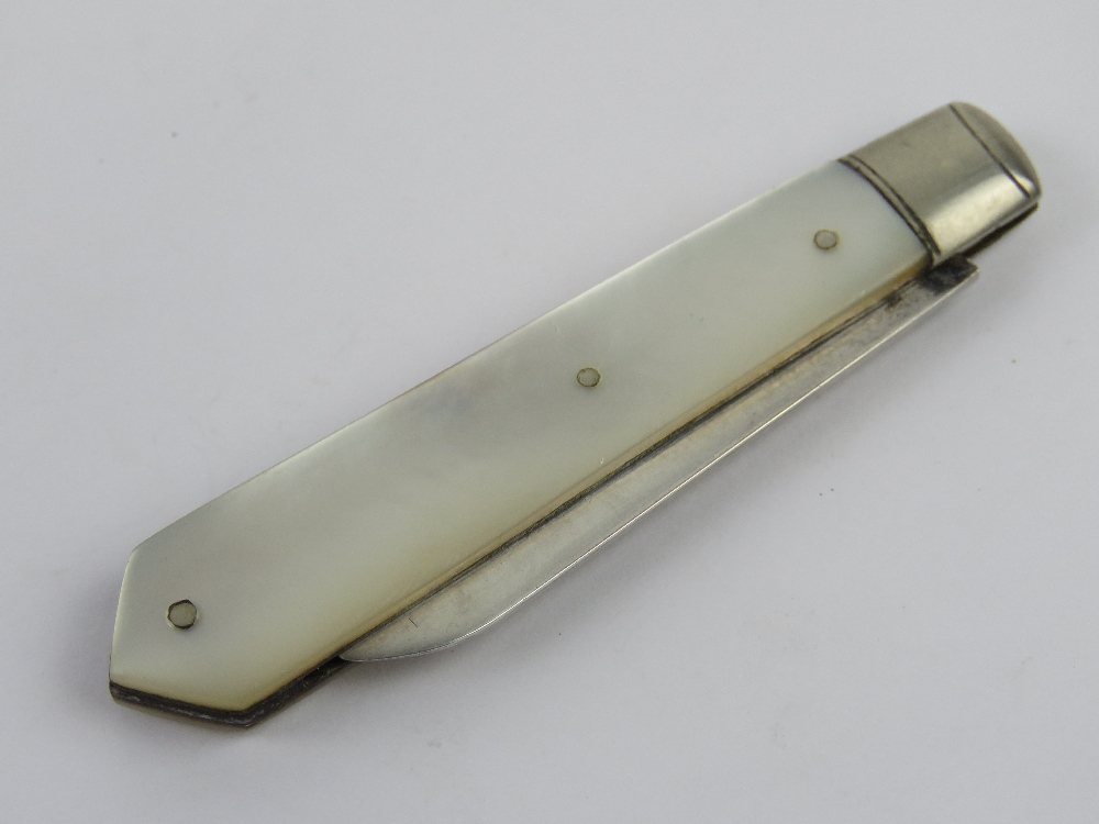 A William Needham HM silver and mother of pearl fruit knife, Sheffield 1921 hallmark.