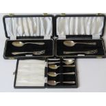 Two hallmarked silver Christening sets comprising spoon and fork,