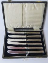 A set of six HM silver handled butter knives, silver plated blades, hallmarked for Sheffield 1924,