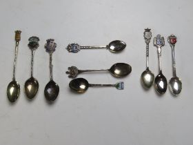 Two HM silver spoons, one continental spoon and six silver plated spoons.