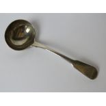 An HM silver short ladle weighing 63.1g / 2.03ozt.