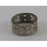 A Maltese silver filigree ring, band measuring 9mm wide, hallmarked 925, size Q.
