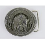 A Buckles of American Native American themed belt buckle having buffalo to centre,