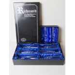 A set of six Richmond cut glass champagne flutes in original box,