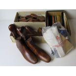 Three pairs of vintage shoe trees together with a quantity of boot brushes, etc.