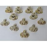 Two sets of silver plated frog themed place card holders.