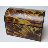 A faux tortoiseshell stationery box opening to reveal wood-lined compartment within, a/f.