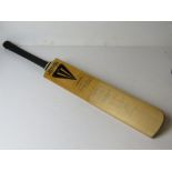 An autograph cricket bat having signatures for Yorkshire,