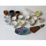A quantity of assorted egg cups inc a Royal Worcester Reg No 546206 and other ceramic items.