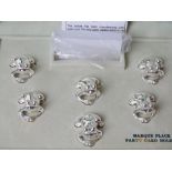 A boxed set of six silver plated frog themed place card holders by Ercuis Paris,