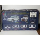 A W463 G-Class 1986-2013 headlamp cover set in box.