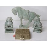 Three carved stone oriental figurines being a pair of Fo dogs and horse.