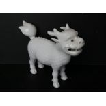 A late 19th / early 20thC Japanese Hirado porcelain figure of a Kirin - mythical creature having