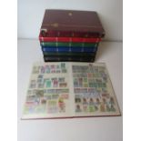 A collection of 20th century World Stamps in seven albums includes Ceylon and Rhodesia.